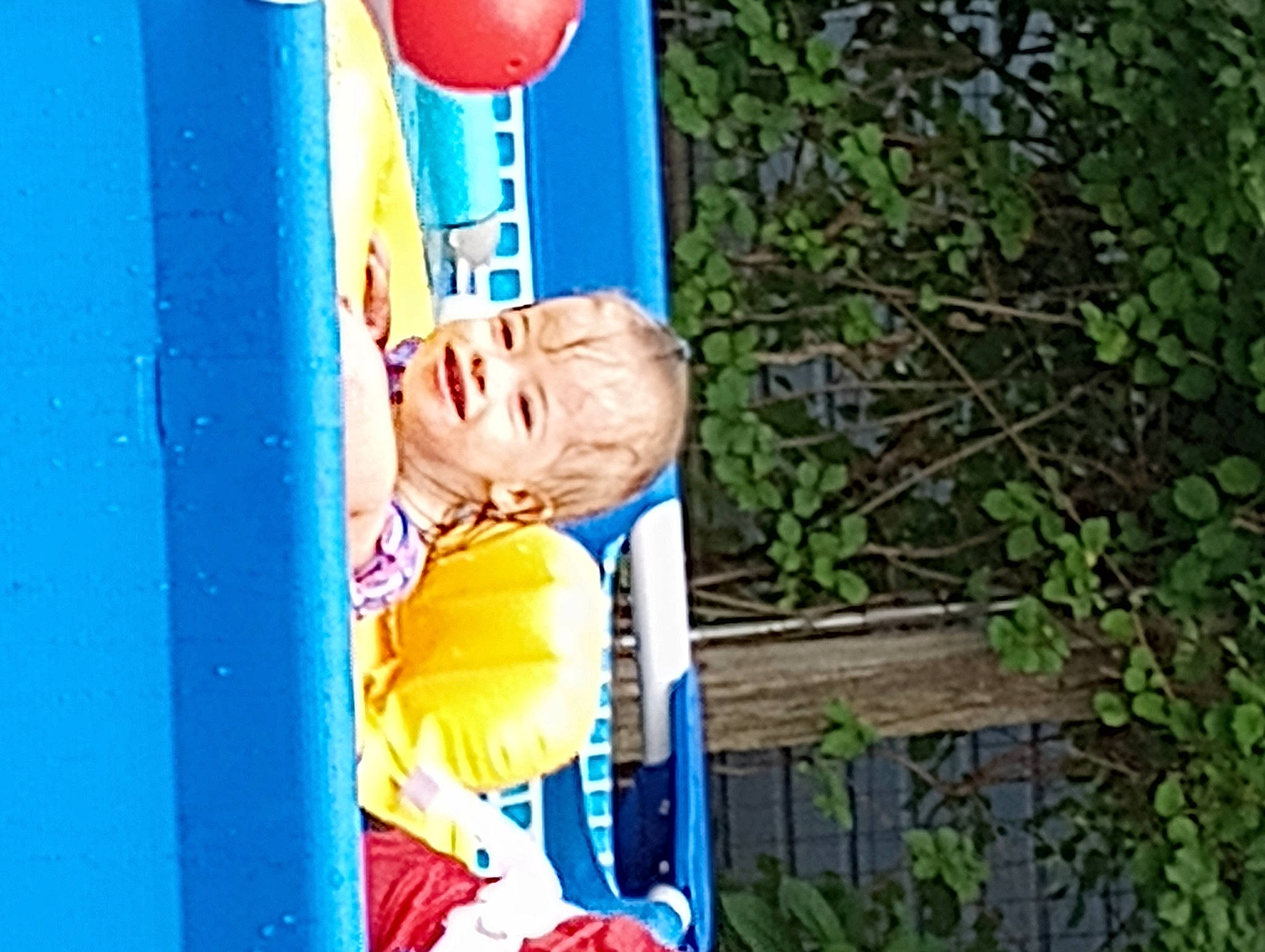 Mya is registered to the contest to win money with this photo: art, blue, child, city, electric_blue, fun, gas, happy, joy, leisure, outdoor_play_equipment, person, playground, recreation, smile, t_shirt, visual_arts, wood