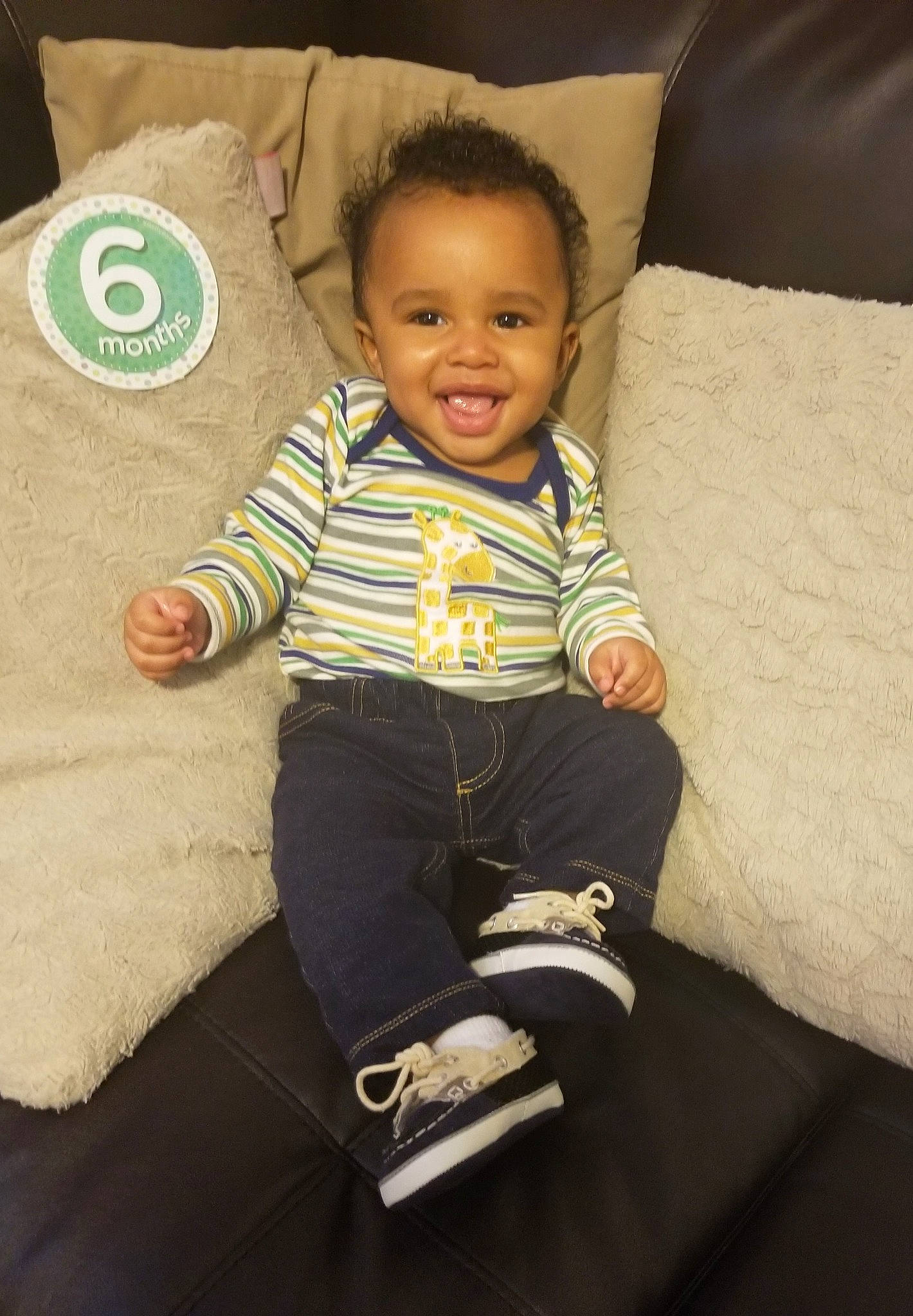 Tristan joined the competition — help win amazing prizes! baby, child, electronic_device, head, joy, person, shoe, sitting, skin, smile, t_shirt, technology, toddler