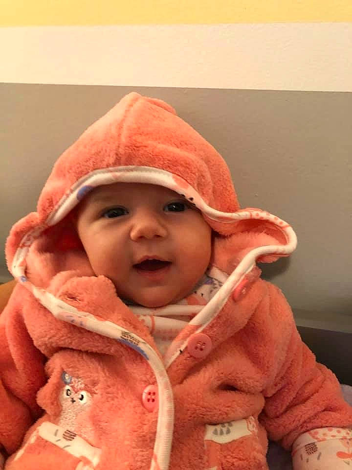 Jaelyn joined the competition — help win amazing prizes! baby, child, headwear, outerwear, peach, person, skin, toddler