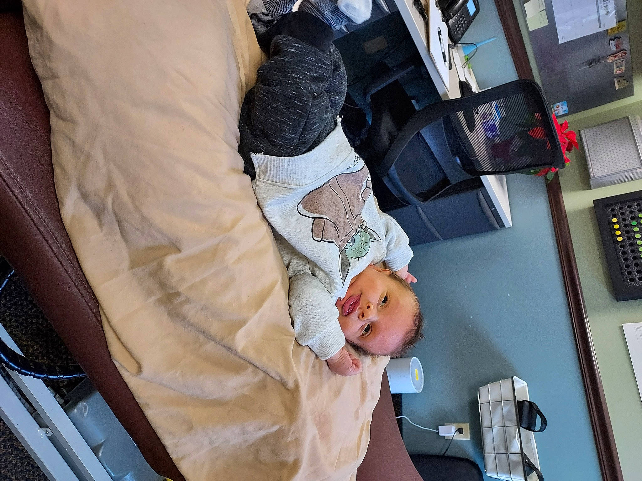 Wyatt is registered to the contest to win money with this photo: baby, baby_products, car_seat, chair, child, clinic, comfort, health_care, hospital, human_leg, linens, machine, medical, medical_equipment, medical_procedure, patient, person, room, service, toddler