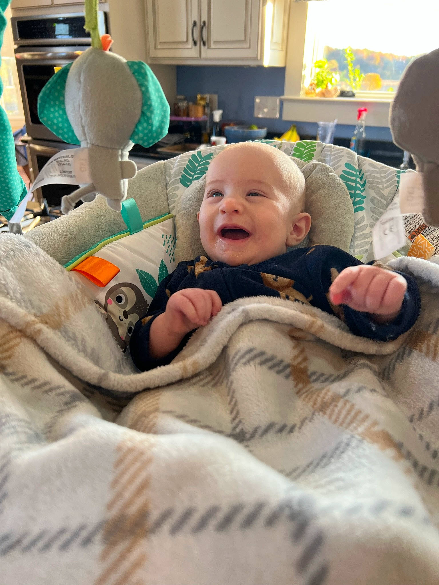 Reid joined the competition — help win amazing prizes! baby, baby_laughing, baby_products, baby_toddler_clothing, bed, bedding, child, comfort, fun, happy, linens, pattern, person, room, sitting, skin, smile, t_shirt, toddler, vacation
