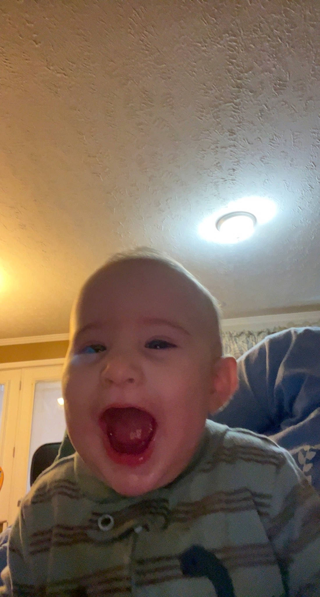 Reid is registered to the contest to win money with this photo: baby, cheek, chin, ear, eyebrow, eyelash, finger, forehead, gesture, happy, iris, jaw, lighting, lip, mouth, nose, person, skin, smile, tongue