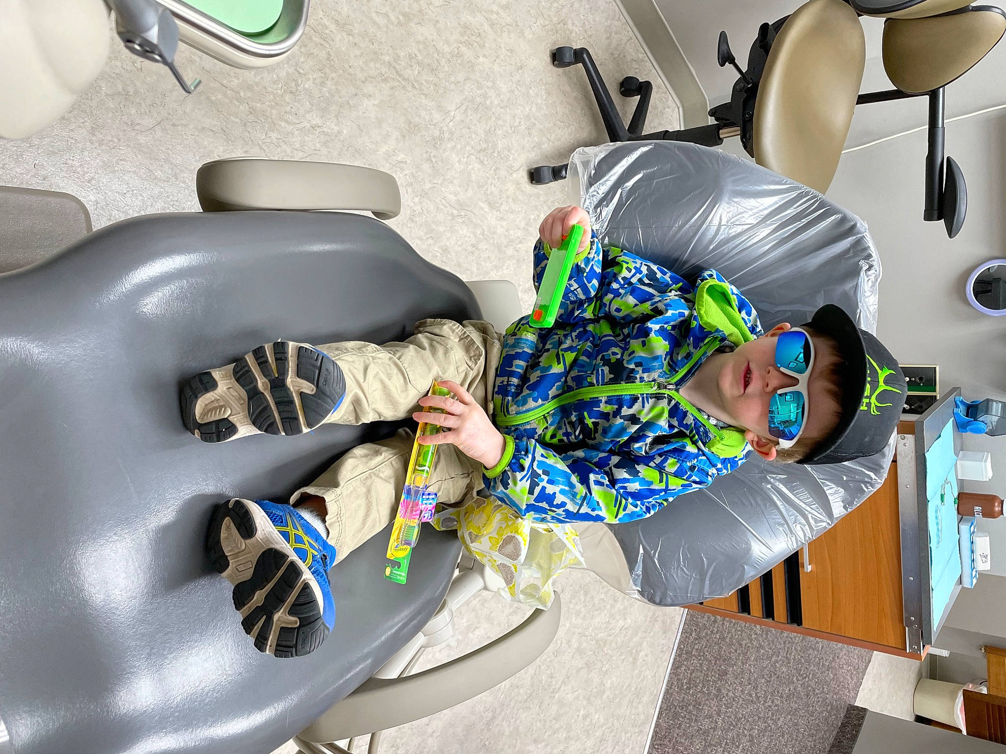 Brantley is registered to the contest to win money with this photo: automotive_design, automotive_lighting, automotive_tire, bag, carmine, child, comfort, eyewear, fun, glove, health_care, human_leg, knee, leisure, person, personal_protective_equipment, product, sitting, sports_gear, sportswear