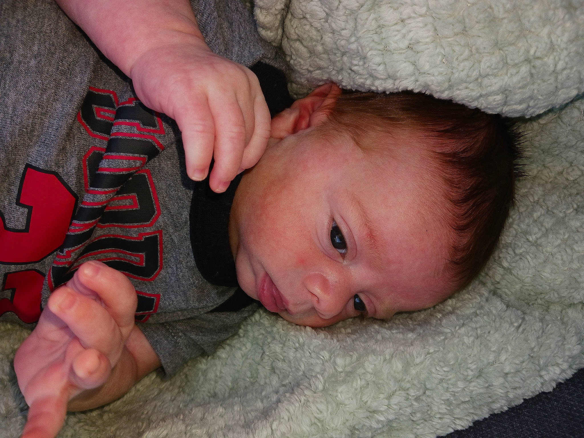 Liam joined the competition — help win amazing prizes! arm, baby, baby_toddler_clothing, cheek, chin, comfort, eye, face, facial_expression, finger, gesture, hand, head, lip, mouth, nose, person, skin, thumb, toddler