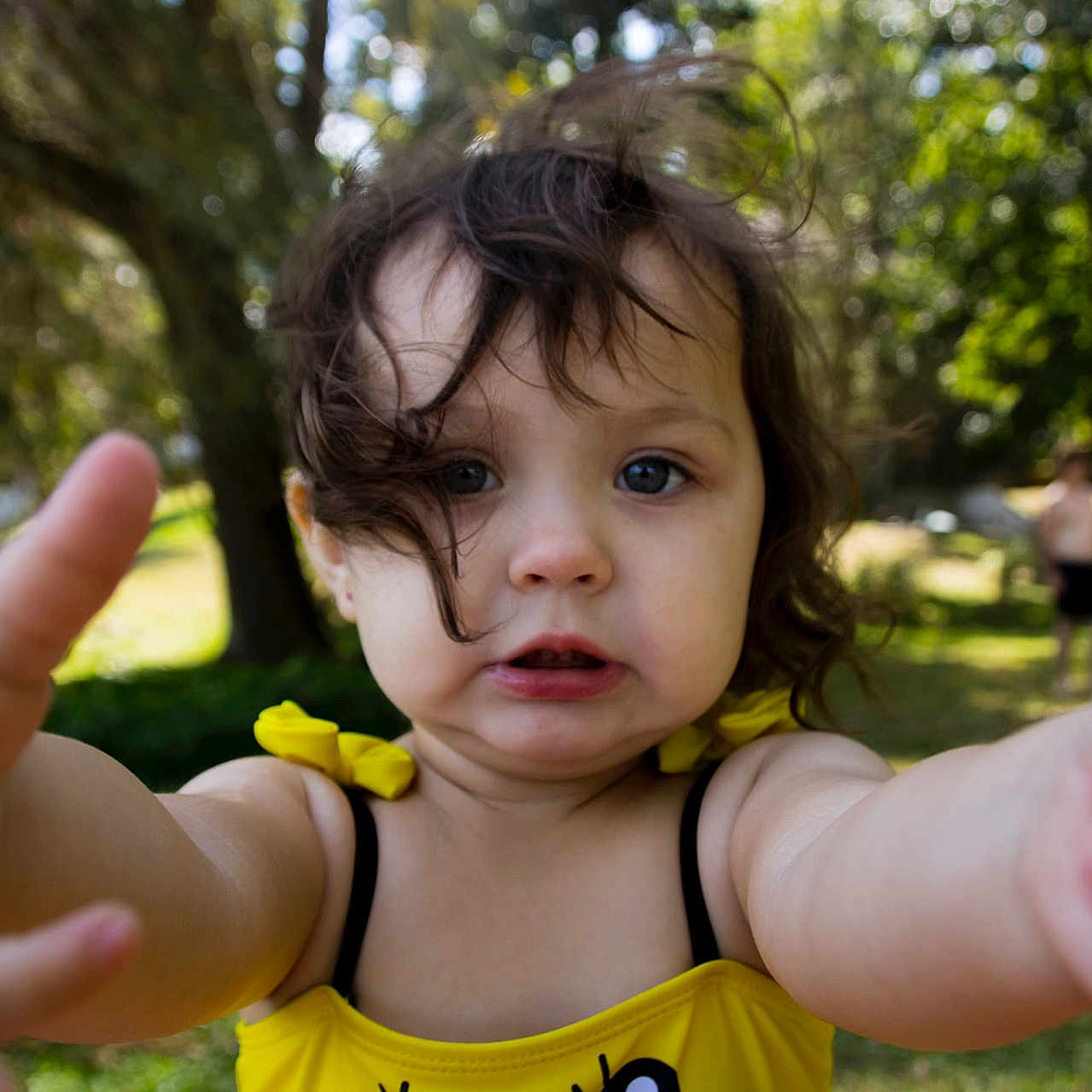 Kasia joined the competition — help win amazing prizes! arm, baby, bodypart, face, finger, frown, grass, hand, head, nature, outdoors, person, photography, plant, portrait, sad, thumbsup, tree, vegetation, wrist