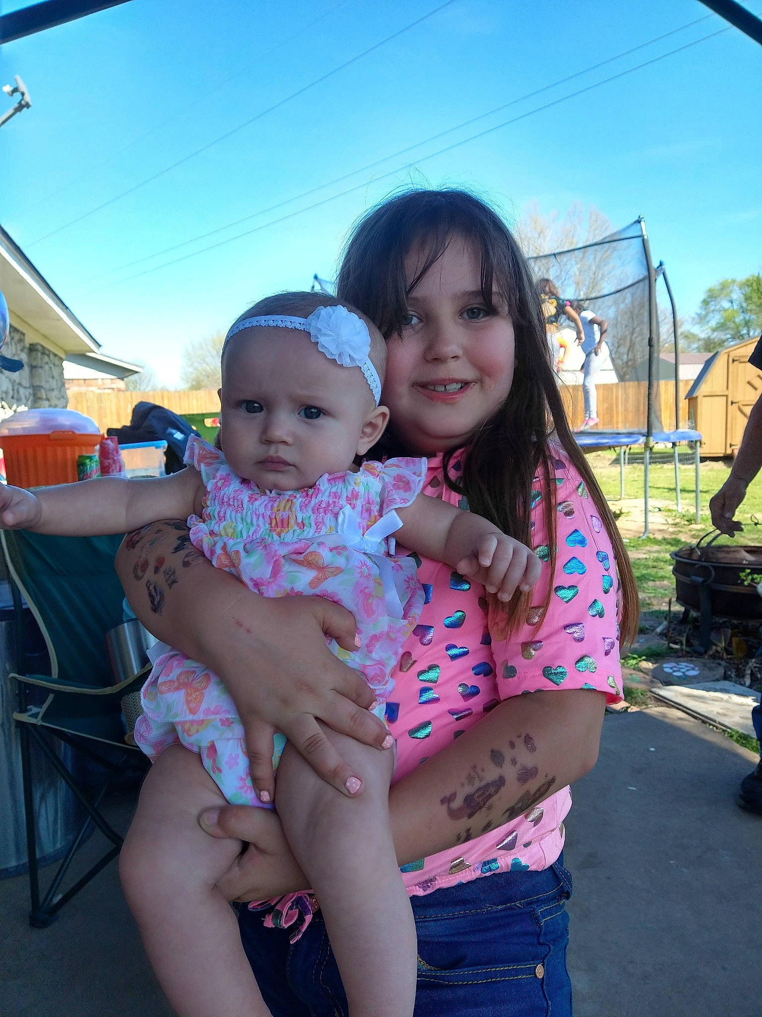 Lilly joined the competition — help win amazing prizes! abdomen, baby, child, event, face, fun, happy, headwear, joy, leisure, person, pink, recreation, sitting, skin, sky, smile, thigh, toddler, travel