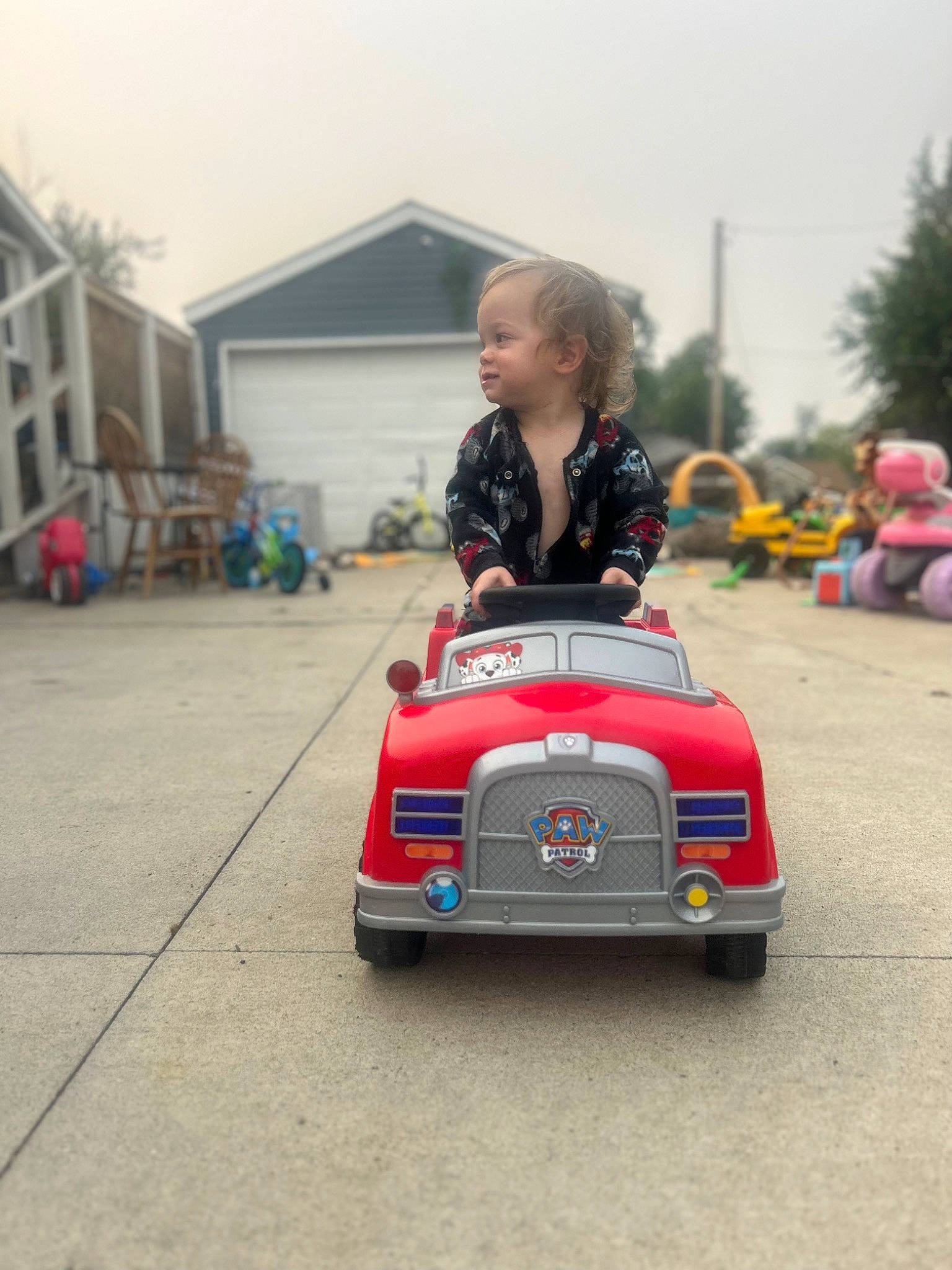 Sebastian joined the competition — help win amazing prizes! asphalt, automotive_design, automotive_exterior, automotive_tire, automotive_wheel_system, bumper, car, classic, classic_car, fun, grass, motor_vehicle, person, racing, riding_toy, sky, tire, toddler, tree, vehicle