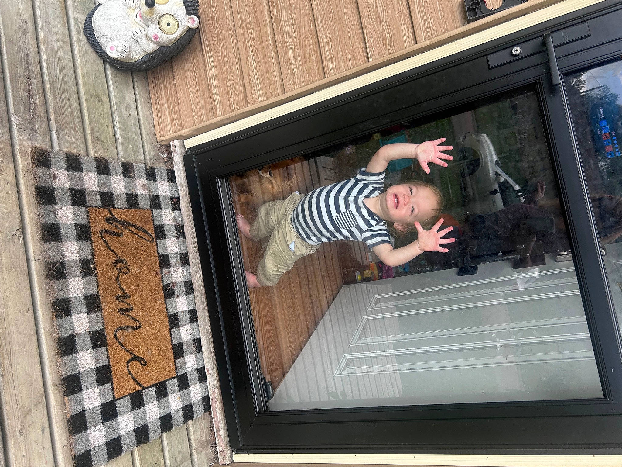 Sebastian joined the competition — help win amazing prizes! building, child, composite_material, facade, flooring, font, glass, home_accessories, metal, pattern, person, rectangle, room, t_shirt, tints_and_shades, toddler, window, wood