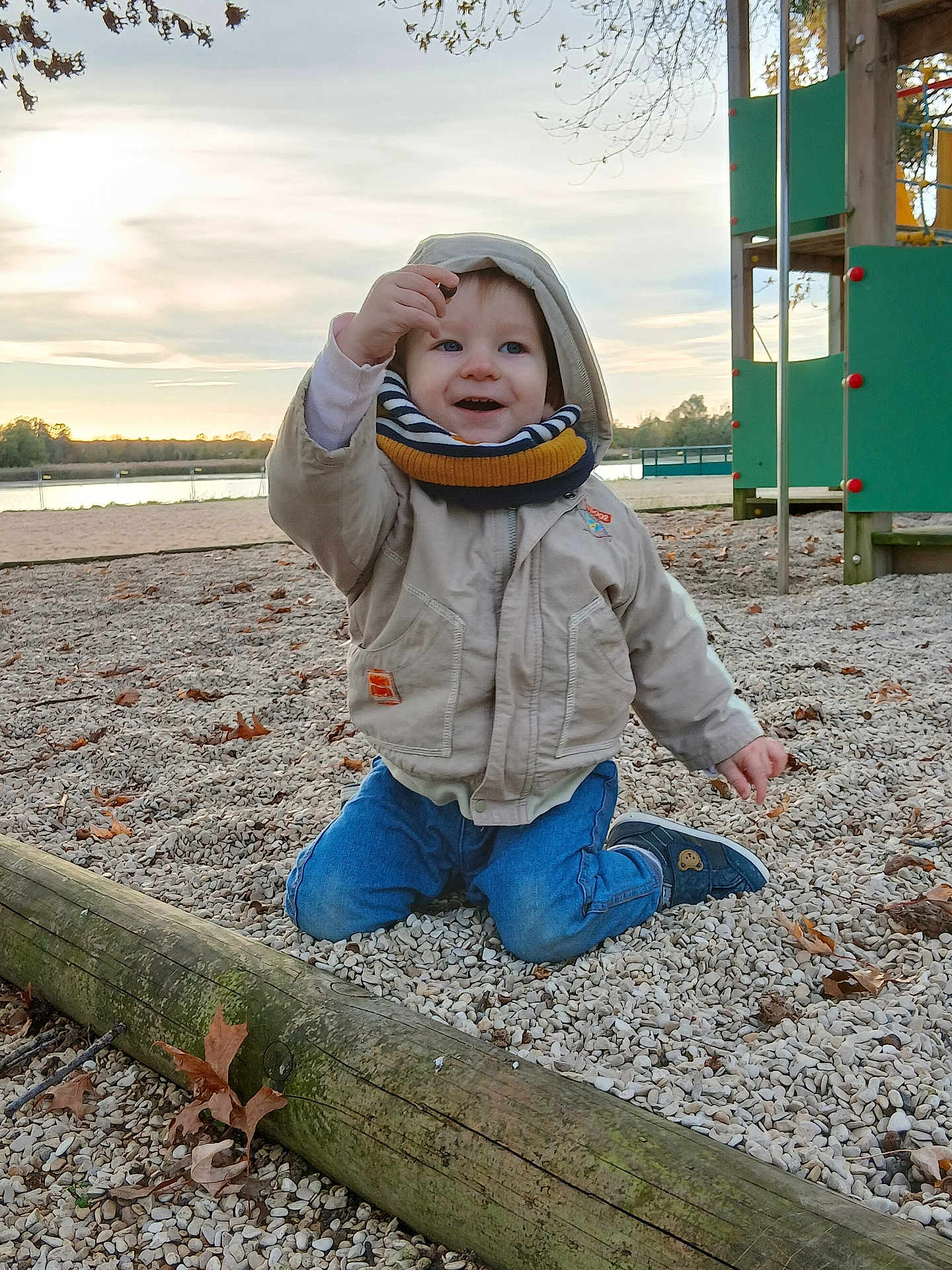 Max participe au concours pour gagner de l'argent avec cette photo : child, fall, happy, jacket, jeans, leaves, nature, outdoor, park, person, playground, scarf, shoe, sky, smile, stones, sunset, toddler, water, wood
