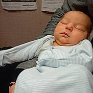 Silas is registered to the contest to win money with this photo: architecture, baby, bed, bedroom, blanket, building, clothing, face, furniture, head, hospital, indoors, newborn, pants, person, photography, portrait, room, sleeping, text
