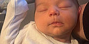 Silas is registered to the contest to win money with this photo: architecture, baby, bed, blanket, building, clothing, crib, cushion, face, furniture, glove, head, homedecor, hospital, infantbed, newborn, person, photography, portrait, sleeping