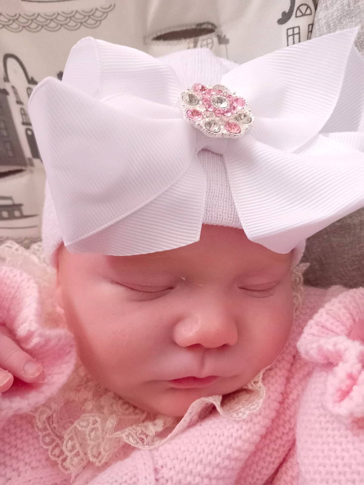 Aria-rose joined the competition — help win amazing prizes! baby, baby_sleeping, baby_toddler_clothing, cheek, child, comfort, fashion_accessory, hair_accessory, happy, headband, headgear, headpiece, headwear, linens, magenta, pattern, peach, person, pink, skin