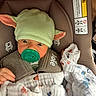 adorable, baby, blanket, car_seat, child, clothing, comfort, cozy, cute, hat, headwear, indoor, infant, newborn, pacifier, person, resting, seatbelt, small, wrapped