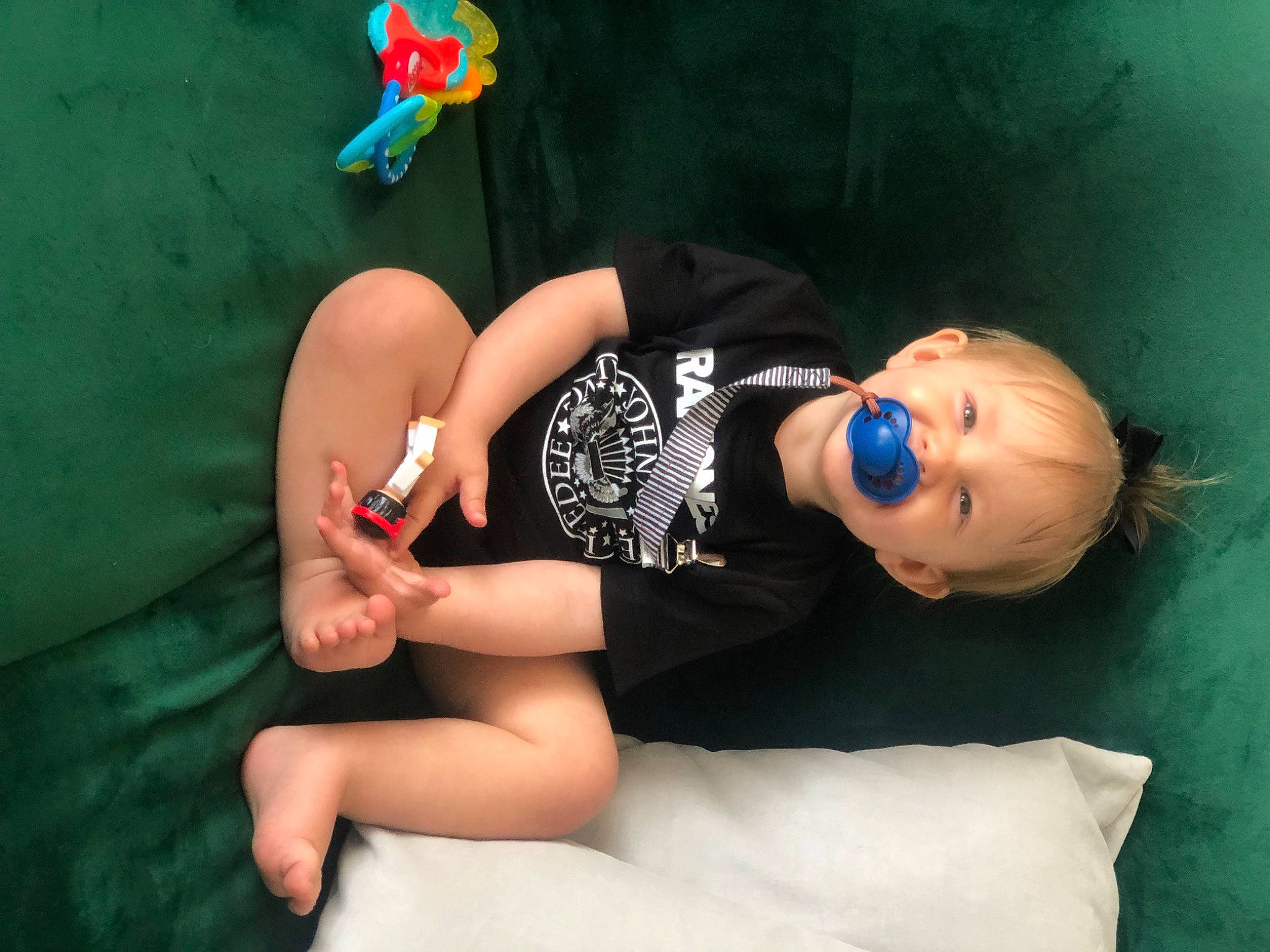 Sayla joined the competition — help win amazing prizes! baby_toddler_clothing, blond, chalk, child, electric_blue, flash_photography, fun, gesture, happy, hat, headgear, human_leg, jewellery, knee, person, sitting, t_shirt, thigh, toddler, toy