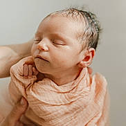 Rose participe au concours pour gagner de l'argent avec cette photo : baby, blanket, child, closeup, cute, hands, head, human, infant, newborn, peaceful, peach, portrait, rest, skin, sleeping, small, soft, tender, wrapped