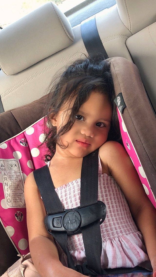 Sandra is registered to the contest to win money with this photo: auto_part, automotive_design, automotive_exterior, beauty, car_seat, car_seat_cover, comfort, finger, head_restraint, motor_vehicle, person, pink, product, skin, snapshot, steering_part, steering_wheel, thigh, toddler, vehicle_door