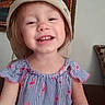 beige_hat, child, couch, cute, dress, face, frame, happy, hat, headwear, indoor, painting, person, pillow, pink_flamingos, portrait, smiling, striped_dress, toddler, young_child
