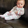 Cora joined the competition — help win amazing prizes! baby, infant, pajamas, owl_pattern, leather_couch, seated, indoor, child, cute, portrait, young, person, cozy, comfortable, furniture, expression, looking, face, skin, hair