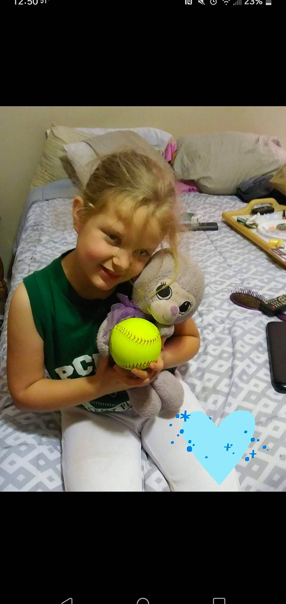 Kelsey joined the competition — help win amazing prizes! audio_equipment, baby_products, baby_toys, ball, child, electronic_instrument, fun, happy, joy, leisure, person, play, plush, recreation, room, sports_equipment, sports_toy, stuffed_toy, t_shirt, tennis_ball