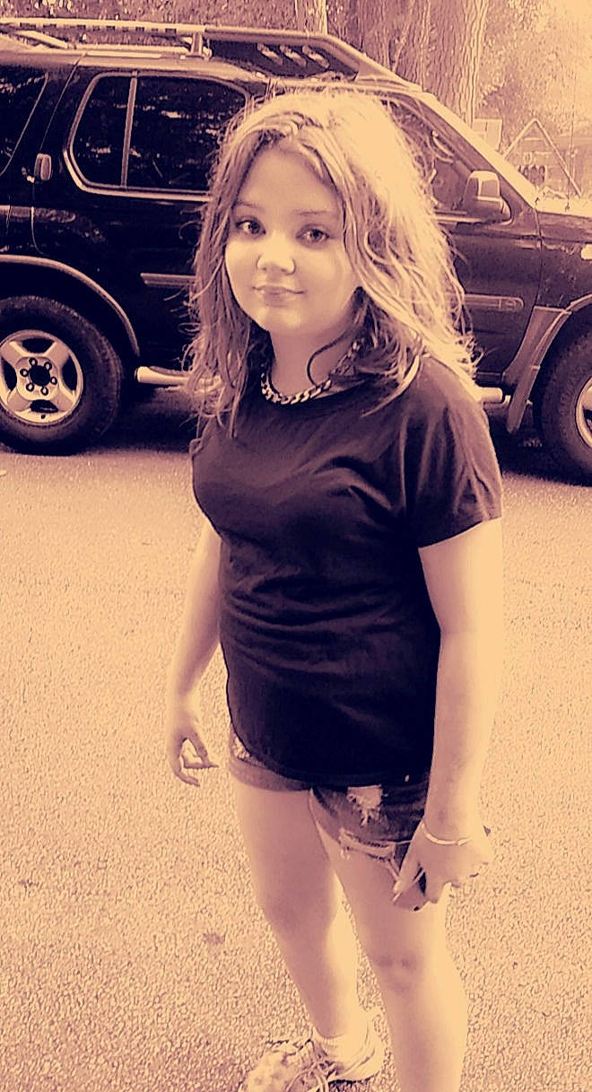 Kelsey is registered to the contest to win money with this photo: automotive_design, automotive_lighting, automotive_tire, car, eye, fashion, flash_photography, hair, hairstyle, happy, head, human_body, joy, leg, motor_vehicle, person, shoulder, standing, street_fashion, tire