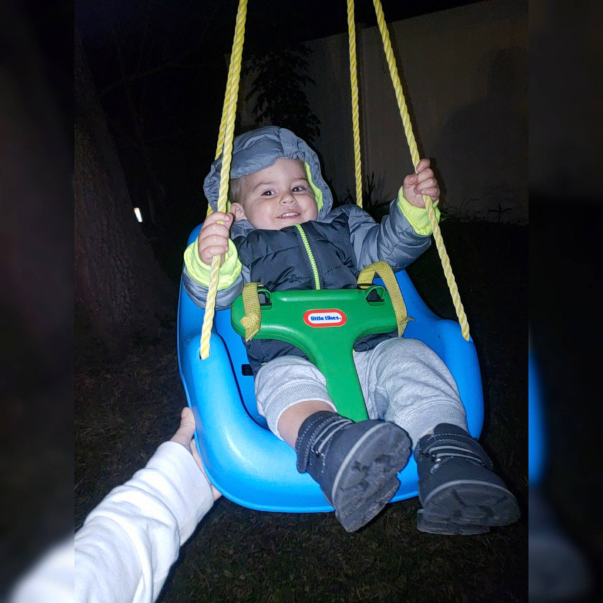 Danilo is registered to the contest to win money with this photo: child, fun, joy, leisure, outdoor_play_equipment, person, personal_protective_equipment, play, product, recreation, space, swing, toddler