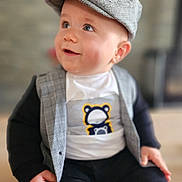 Ayaz a rejoint le concours — aidez-le/la à gagner de superbes lots ! baby, black_pants, blue_eyes, boy, cap, child, clothing, cute, face, fashion, hand, happy, hat, indoor, infant, portrait, sitting, smile, vest, white_shirt