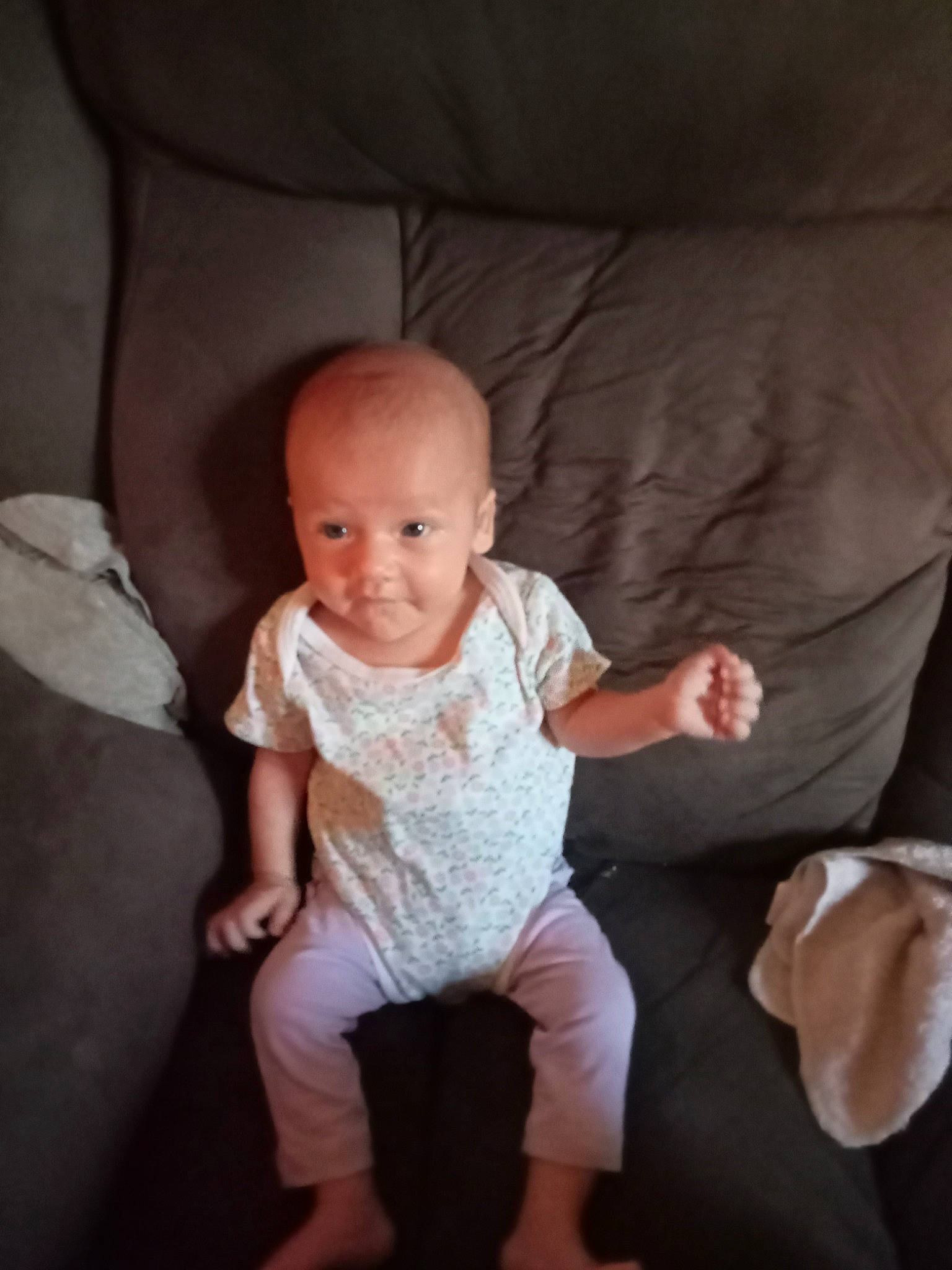 Hanna joined the competition — help win amazing prizes! baby, baby_toddler_clothing, cheek, child, comfort, couch, finger, flash_photography, flooring, gesture, happy, leg, linens, person, shorts, sitting, skin, sleeve, smile, t_shirt