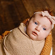 Leona joined the competition — help win amazing prizes! accessories, baby, blanket, bodypart, clothing, face, finger, hand, happy, hardwood, head, headband, knitwear, newborn, person, photography, portrait, smile, towel, wood