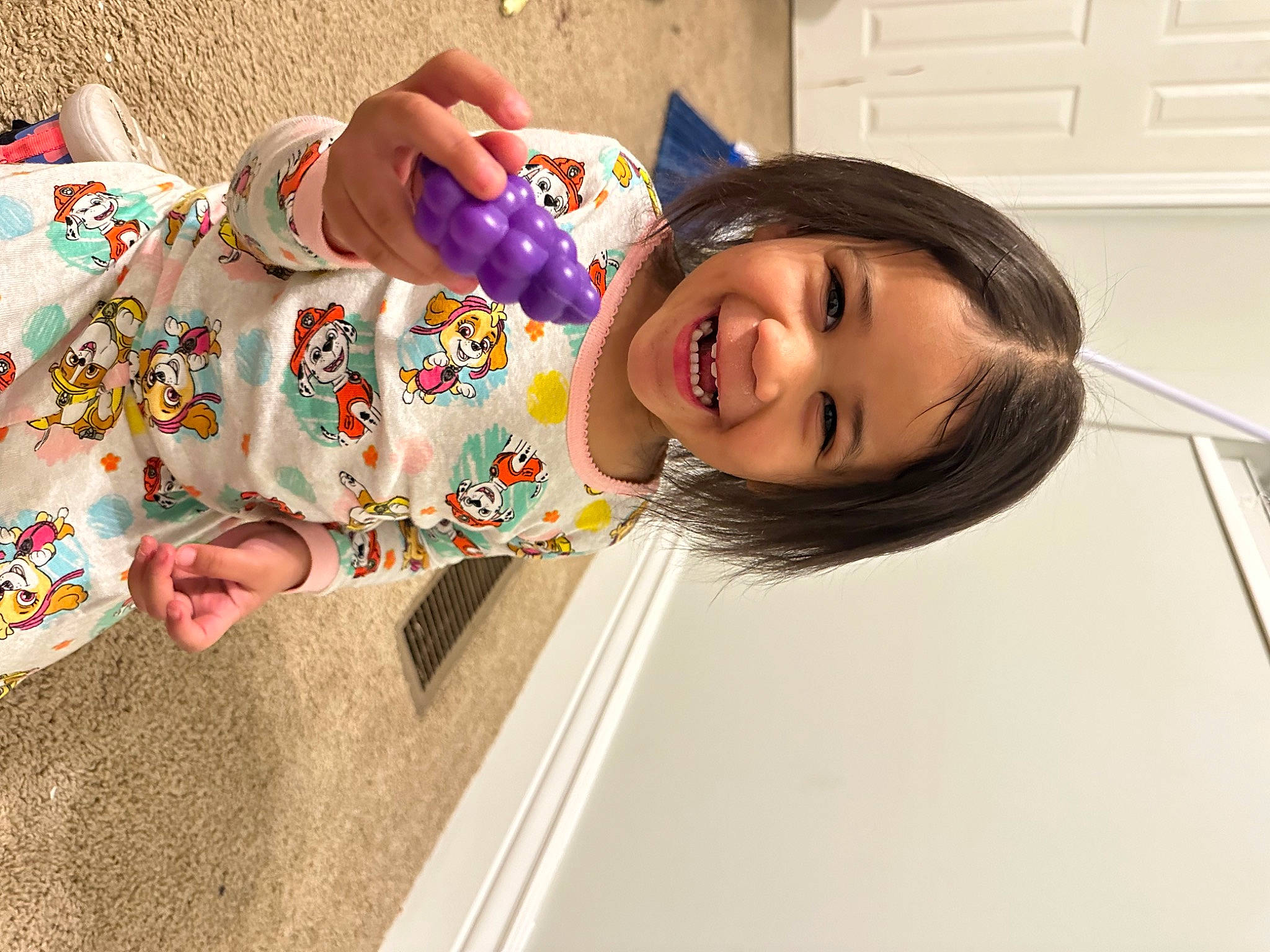 Jaivree is registered to the contest to win money with this photo: baby_toddler_clothing, child, dress, finger, fun, hand, happy, joy, leisure, magenta, nail, pattern, person, play, room, skin, sleeve, smile, t_shirt, toddler