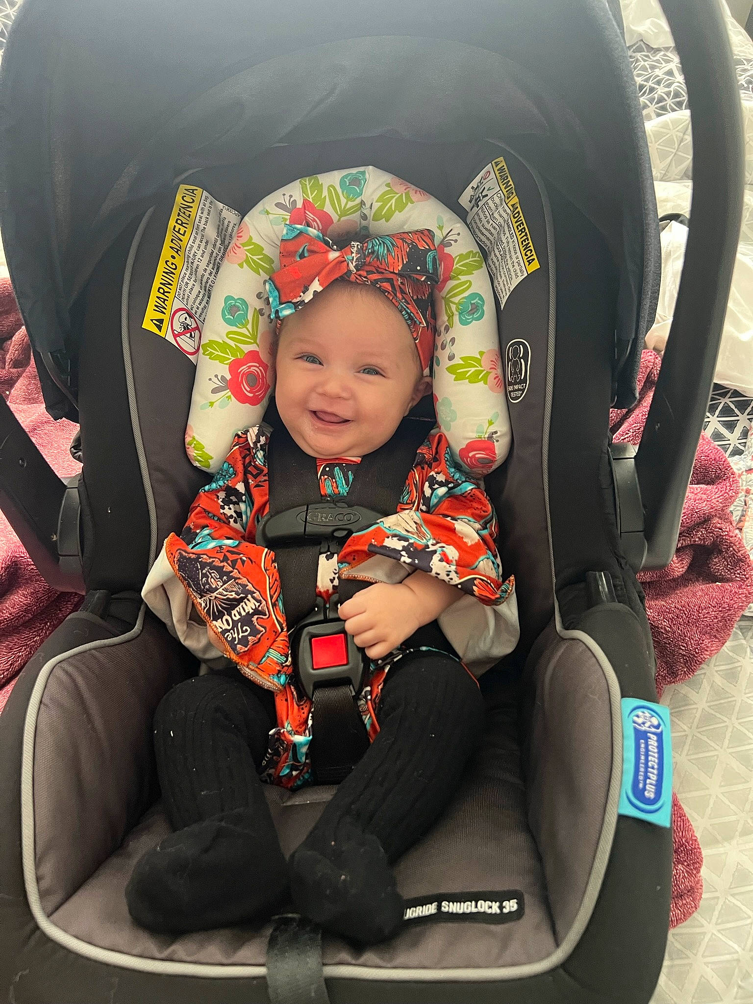 Alaiyah is registered to the contest to win money with this photo: auto_part, baby, baby_carriage, baby_in_car_seat, baby_products, baby_toddler_clothing, car_seat, child, comfort, family_car, fun, headwear, joy, motor_vehicle, person, product, sitting, sleeve, smile, steering_wheel