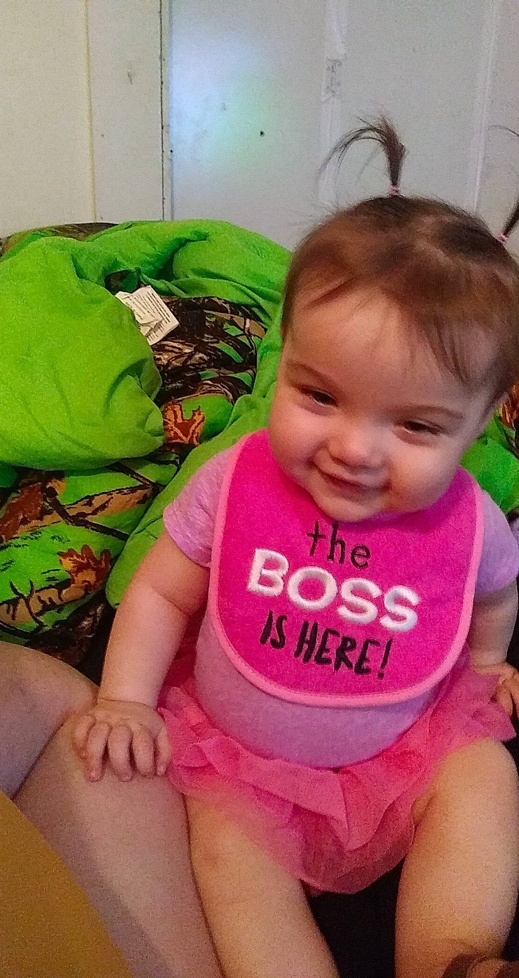 Nova is registered to the contest to win money with this photo: active_tank, baby, baby_products, baby_toddler_clothing, child, comfort, joy, overall, person, pink, sock, thigh, toddler, tongue