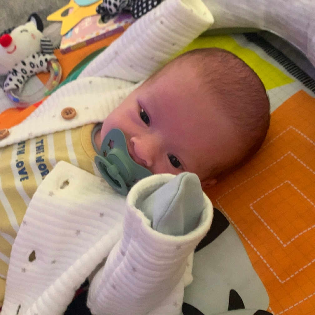 Bentley-Mason joined the competition — help win amazing prizes! baby, bed, blanket, bodypart, clothing, cushion, face, finger, furniture, glove, hand, head, homedecor, newborn, person, photography, portrait, quilt, sleeping, toy