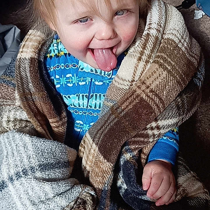 Draven joined the competition — help win amazing prizes! baby, blanket, bodypart, clothing, coat, couch, face, finger, furniture, hand, happy, head, knitwear, mouth, person, photography, portrait, quilt, smile, sweater