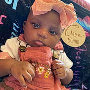 Jocelynn is registered to the contest to win money with this photo: baby, baby_girl, blanket, bow, child, closeup, cute, decor, embroidered, face, hands, indoor, infant, milestone, newborn, pink_clothing, portrait, soft_lighting, two_months, wooden_sign