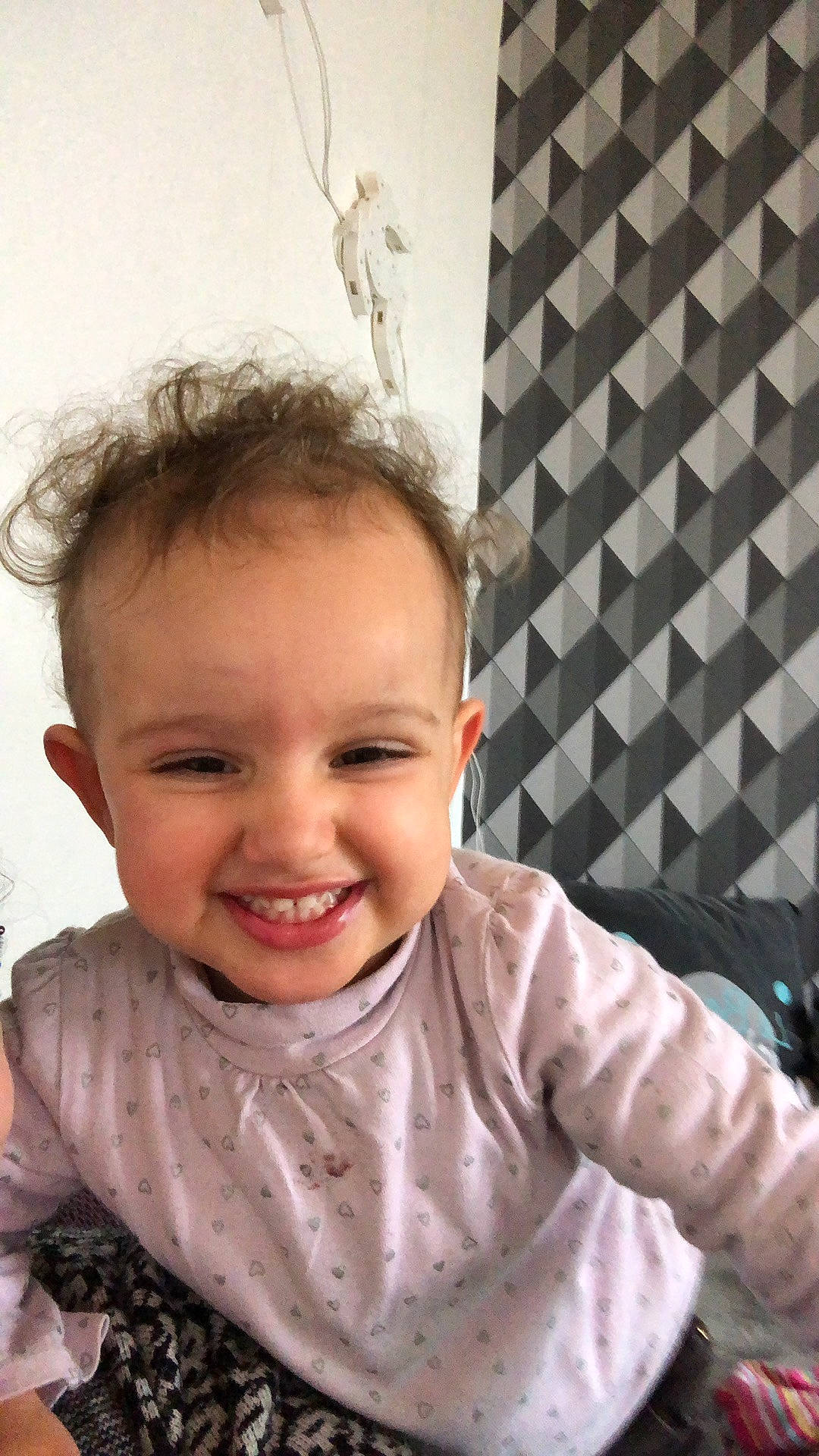 Djena participe au concours pour gagner de l'argent avec cette photo : baby, baby_toddler_clothing, cheek, chin, eye, flash_photography, gesture, hairstyle, happy, head, iris, joy, lip, mouth, nose, person, skin, sleeve, smile, standing