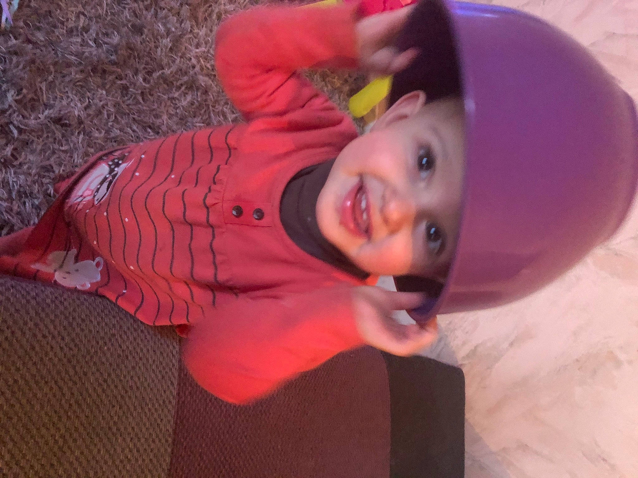 Djena participe au concours pour gagner de l'argent avec cette photo : baby, baby_toddler_clothing, cheek, child, fun, happy, hat, headwear, helmet, joy, magenta, person, pink, smile, toddler, tree, winter