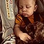 Kobe joined the competition — help win amazing prizes! baby, car_seat, sleeping, blanket, child, infant, seatbelt, curly_hair, clothing, toddler, interior, fabric, closeup, peaceful, portrait, resting, soft_toy, comfort, seat, young_child