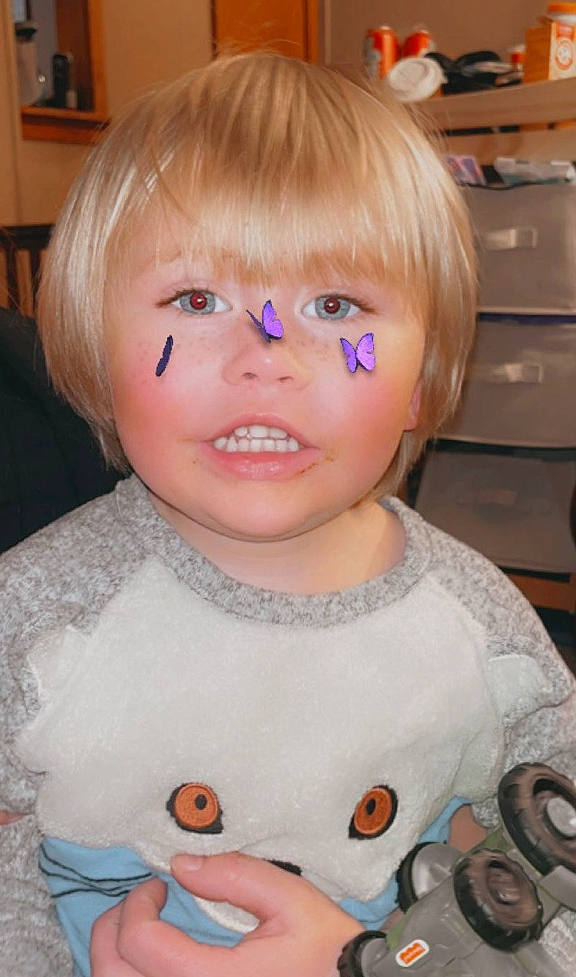 Jaxon is registered to the contest to win money with this photo: baby_toddler_clothing, cabinetry, cheek, eye, eyebrow, eyelash, facial_expression, forehead, head, iris, jaw, lip, nose, organ, person, pink, skin, sleeve, smile, toddler