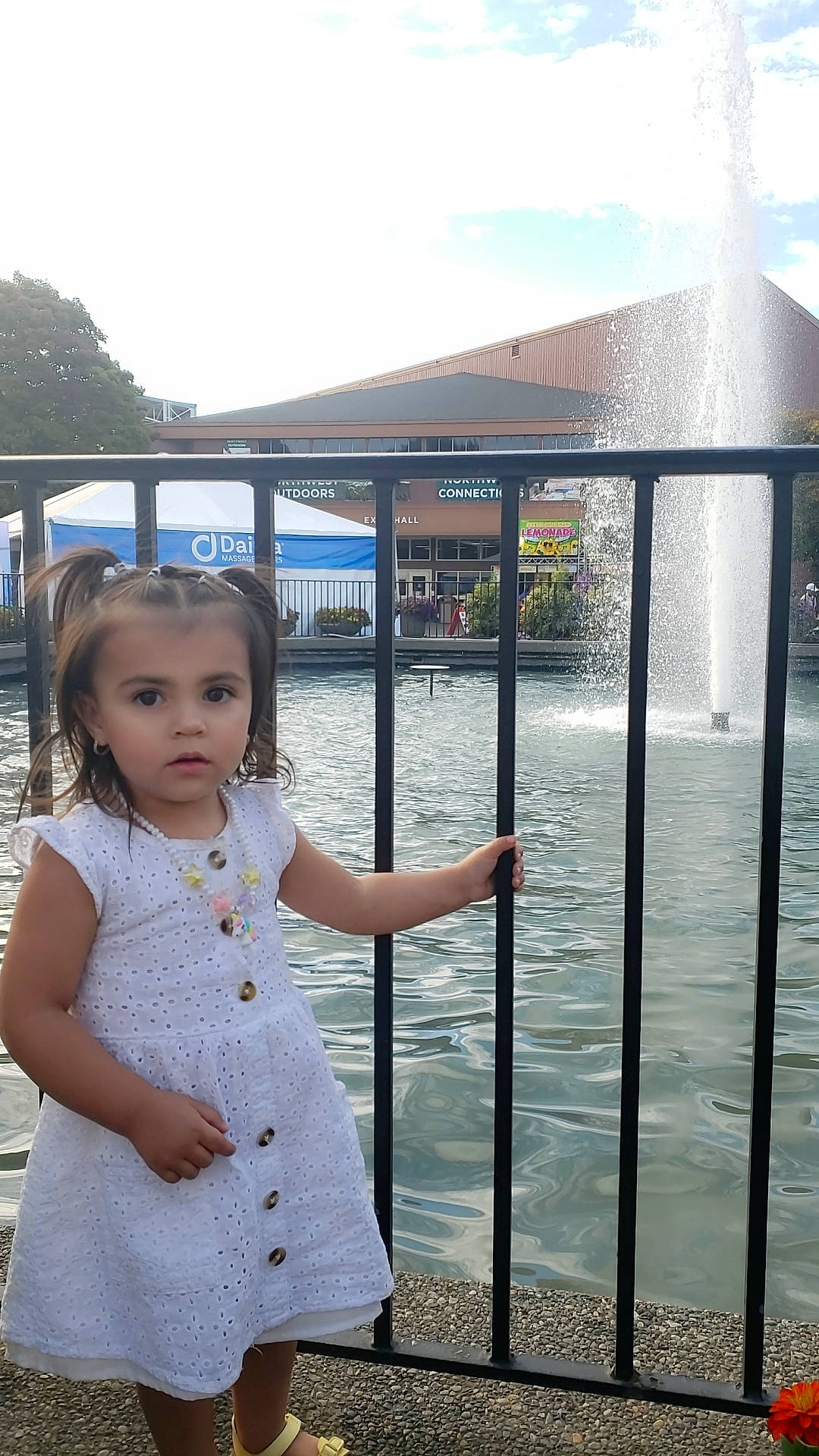 Catalina joined the competition — help win amazing prizes! baby_toddler_clothing, child, fence, fun, glass, handrail, happy, lake, leisure, metal, pattern, person, sky, sleeve, toddler, tourism, travel, tree, vacation, waist