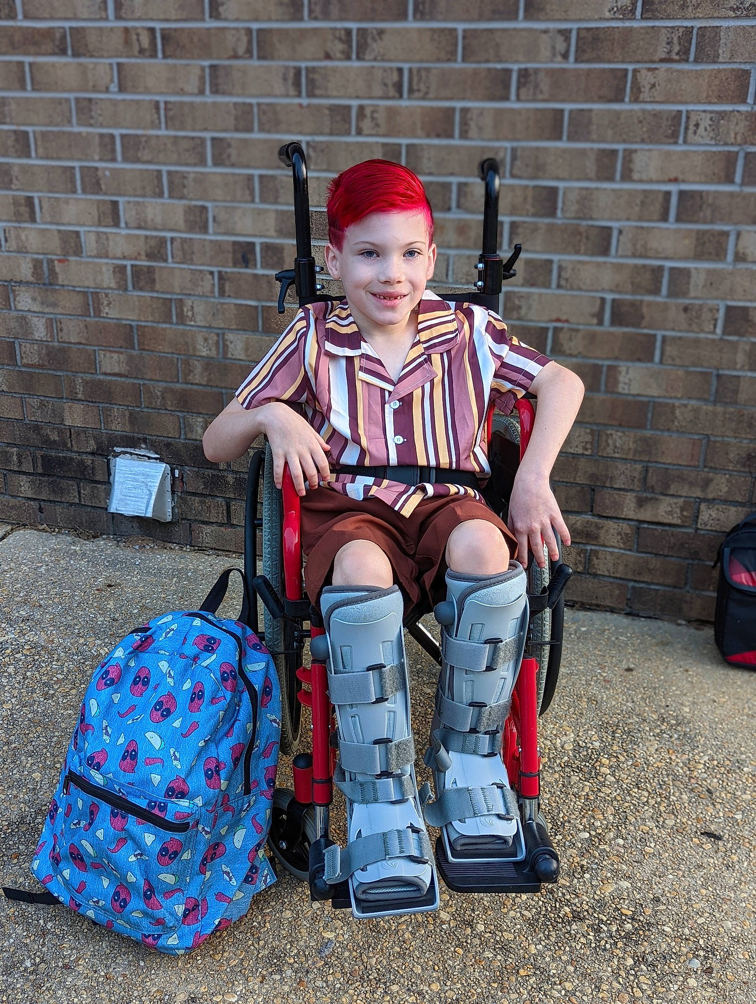 Dante joined the competition — help win amazing prizes! backpack, bag, carmine, child, cosplay, costume, costume_hat, entertainment, eye, fictional_character, fun, hat, human_body, joy, luggage_and_bags, person, personal_protective_equipment, sitting, smile, suspenders