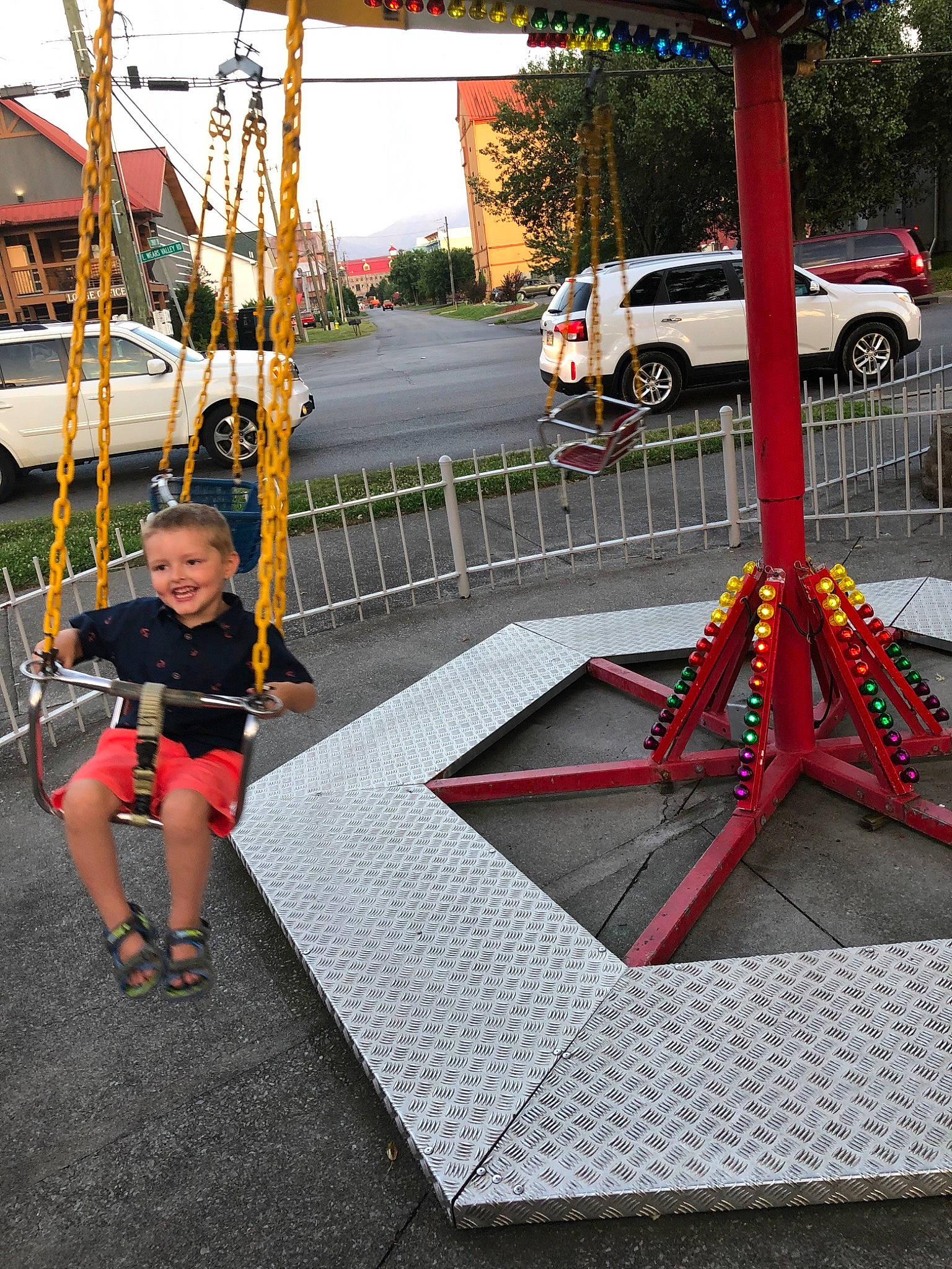 Ryder is registered to the contest to win money with this photo: fun, joy, person, recreation, red, swing, vacation