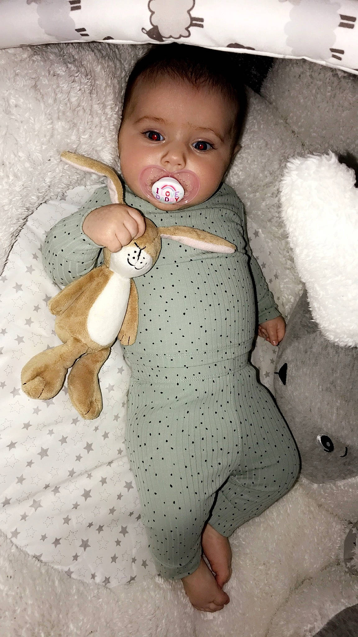 Jessie-leigh is registered to the contest to win money with this photo: arm, baby, baby_toddler_clothing, cheek, comfort, face, finger, gesture, hand, happy, head, joint, linens, neck, nose, person, skin, sleeve, thigh, thumb