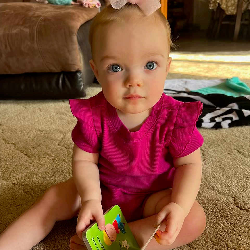 Presley joined the competition — help win amazing prizes! advertisement, baby, bodypart, clothing, couch, crawling, document, face, furniture, hand, head, idcards, passport, person, photography, portrait, sitting, sleeve, text, toy
