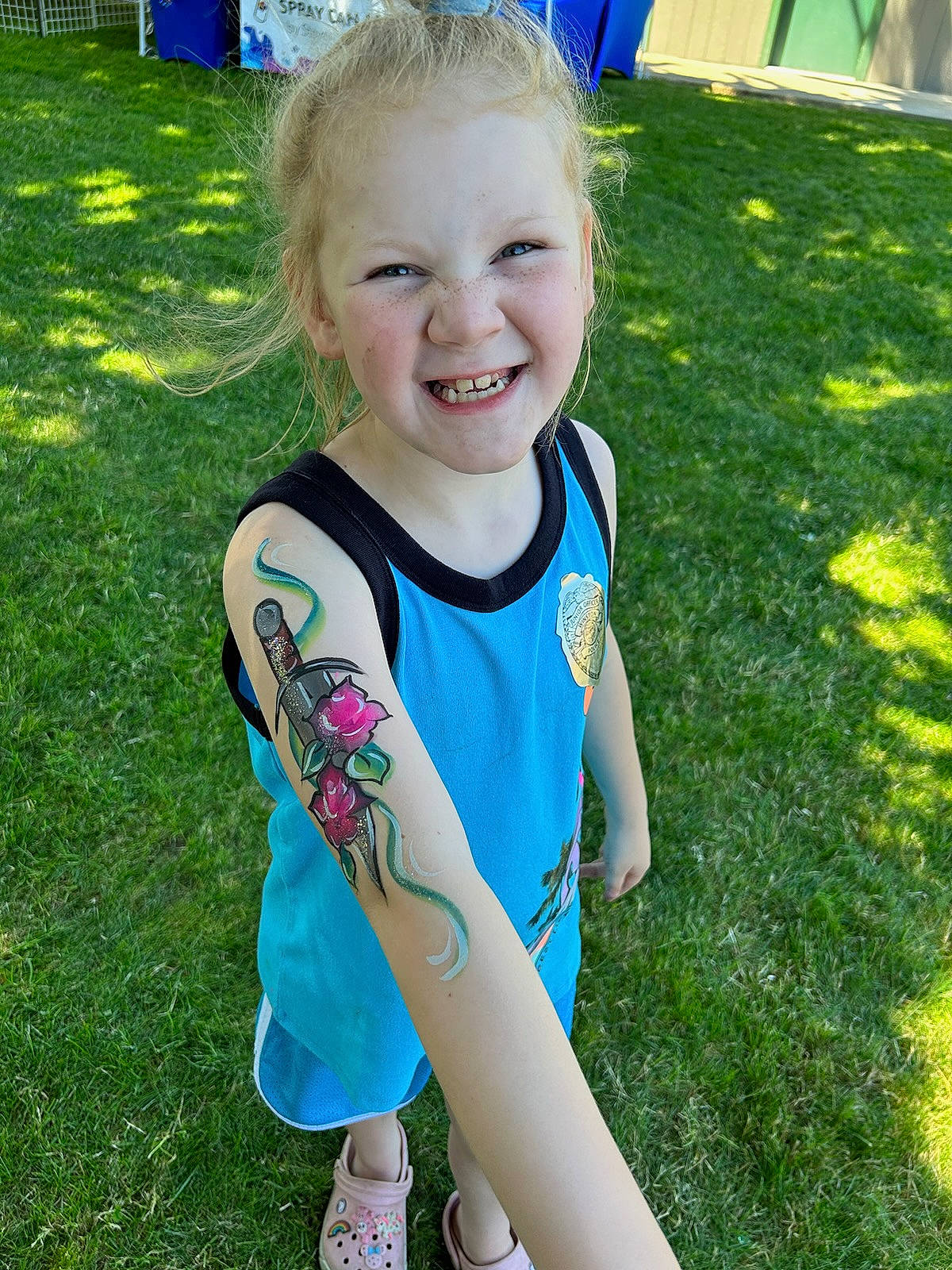 Jazmyne is registered to the contest to win money with this photo: baby_toddler_clothing, blond, blue, child, electric_blue, fun, grass, green, hairstyle, happy, joy, lawn, leisure, people_in_nature, person, recreation, sleeve, smile, spring, summer