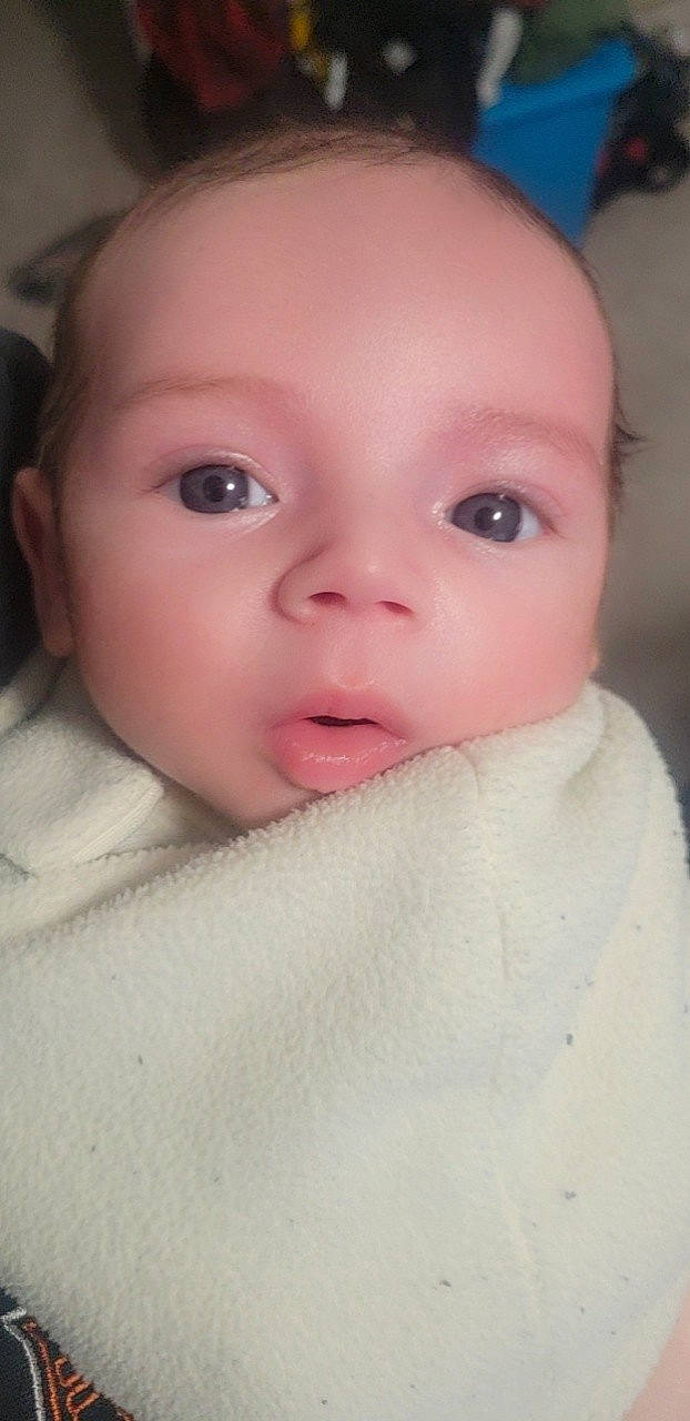 Keaton is registered to the contest to win money with this photo: baby, baby_toddler_clothing, cheek, child, chin, comfort, ear, eyebrow, eyelash, iris, lip, monochrome_photography, no_expression, nose, person, portrait_photography, skin, toddler