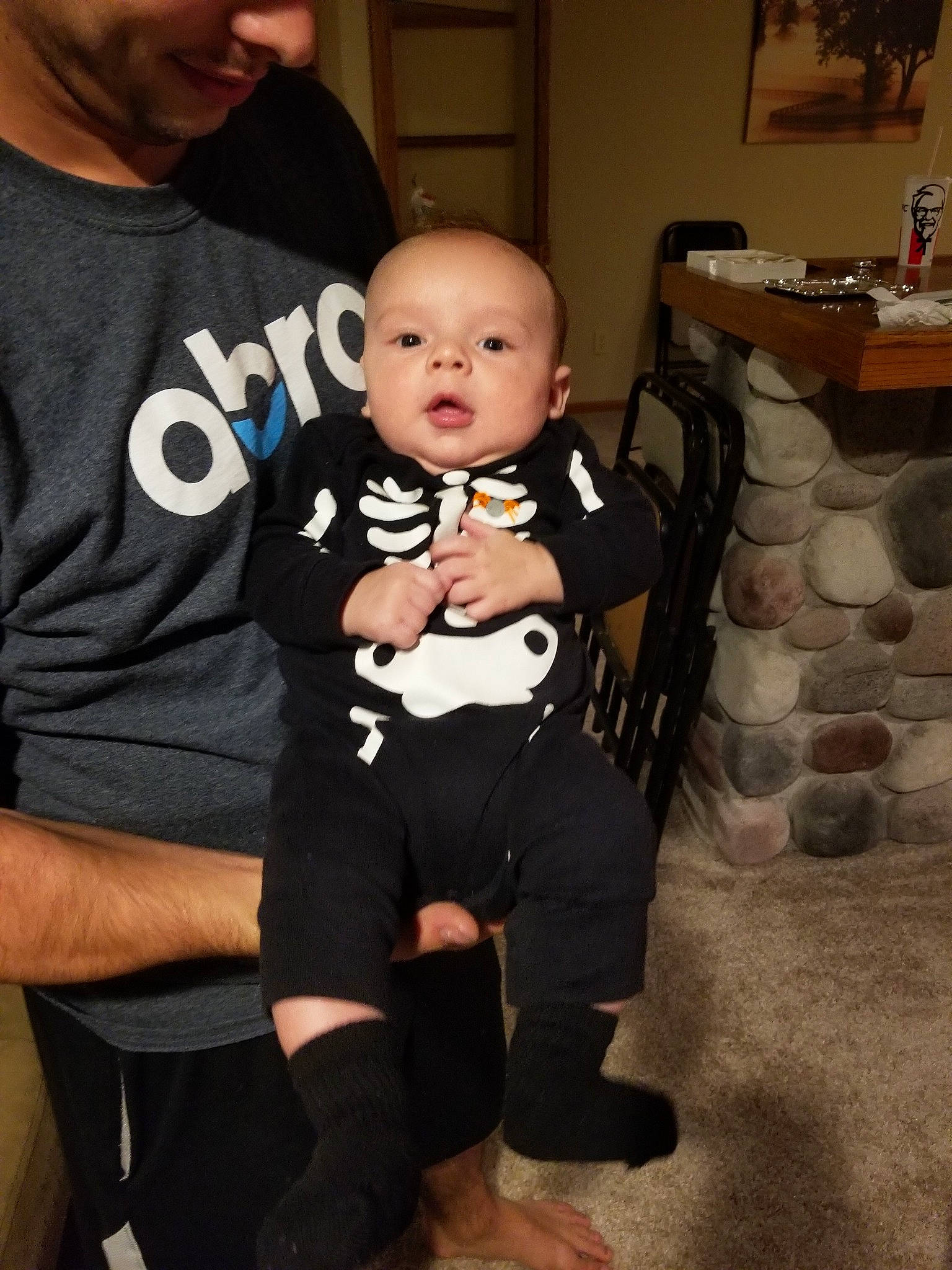 Rylan joined the competition — help win amazing prizes! baby, cheek, child, face, formal_wear, head, headwear, joy, leg, outerwear, person, product, sitting, skin, suit, t_shirt, toddler, tuxedo