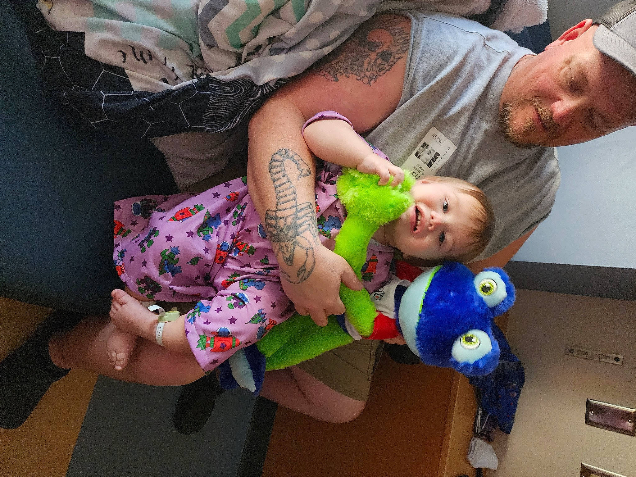 Kashtyn joined the competition — help win amazing prizes! baby, baby_products, baby_toddler_clothing, baseball_cap, cap, child, event, fun, happy, hat, head, headwear, lap, leisure, people, person, room, sitting, sock, t_shirt