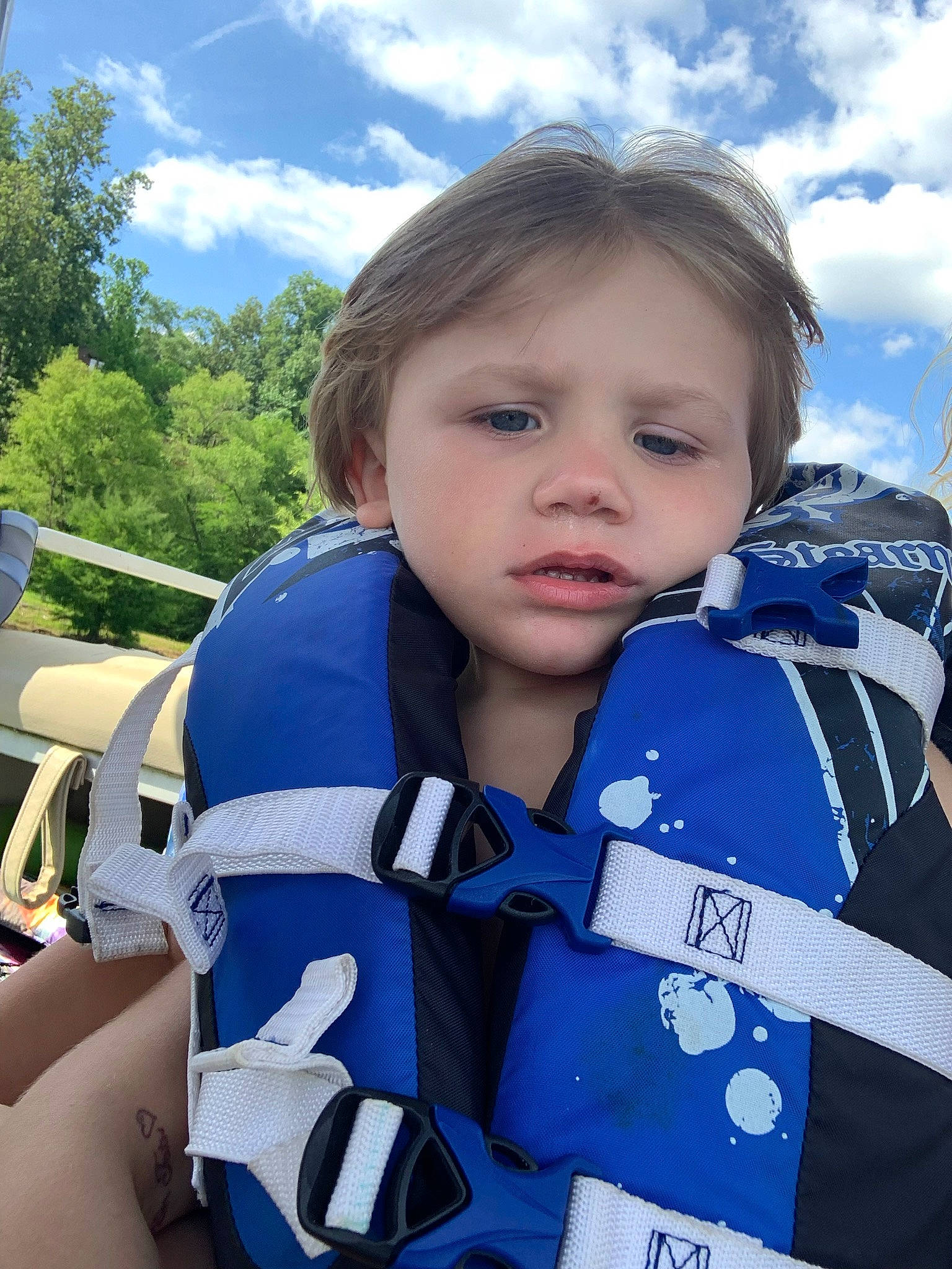 Ashton joined the competition — help win amazing prizes! child, cloud, electric_blue, fashion_accessory, fun, happy, leisure, lifejacket, people_in_nature, person, personal_protective_equipment, recreation, sky, sleeve, toddler, travel, tree, uniform, vacation