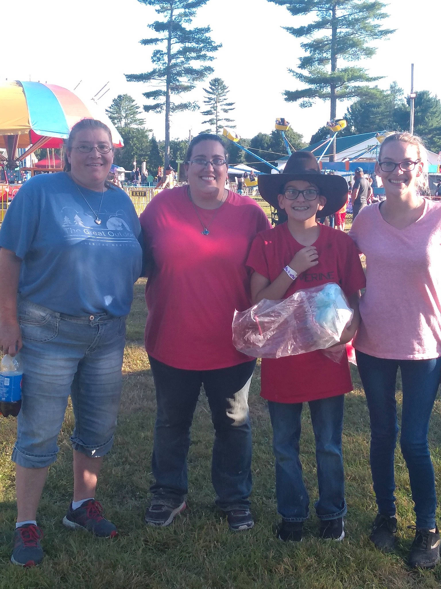 Scott is registered to the contest to win money with this photo: child, community, event, family, fun, joy, leisure, people, person, pink, plant, recreation, social_group, style, t_shirt, team, tree, youth