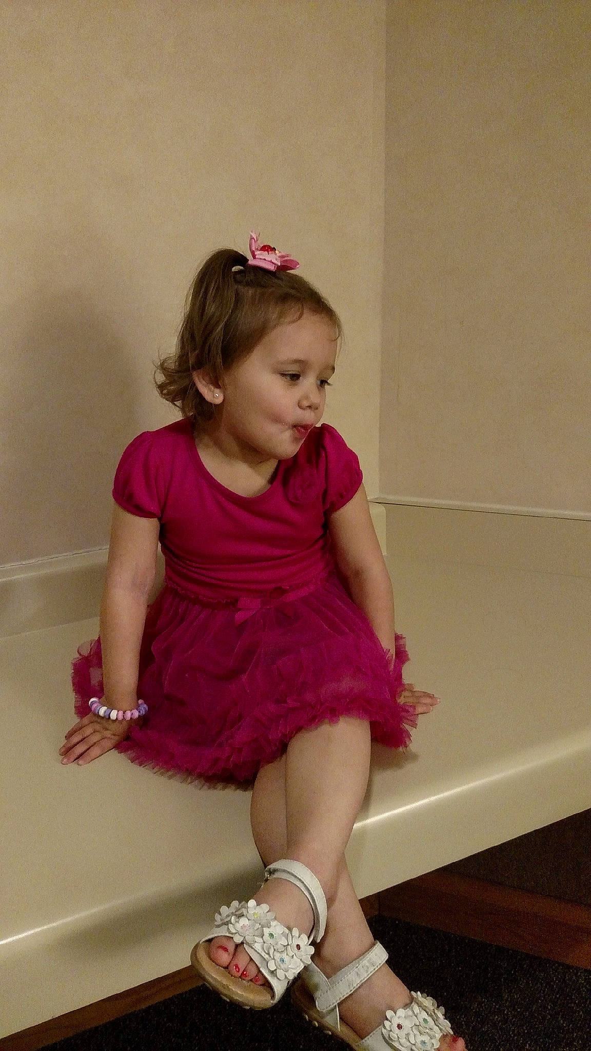 Jordann is registered to the contest to win money with this photo: arm, baby_toddler_clothing, day_dress, dress, embellishment, fashion_design, flooring, fun, hand, happy, human_leg, knee, leg, magenta, person, pink, purple, sleeve, sock, thigh